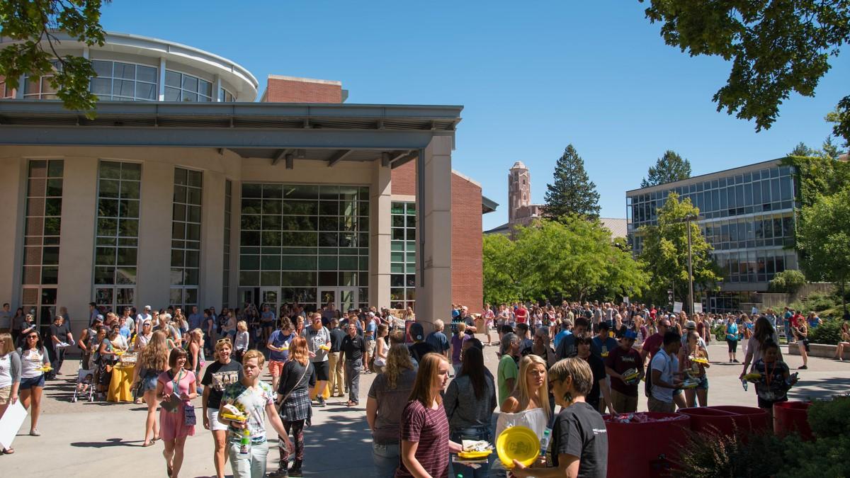 A group of students gathered outside the Idaho Commons