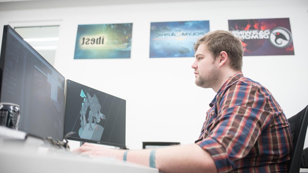 Student collaborator working on computer